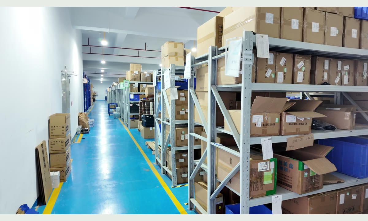 Warehouse aisle at a manufacturing partner facility